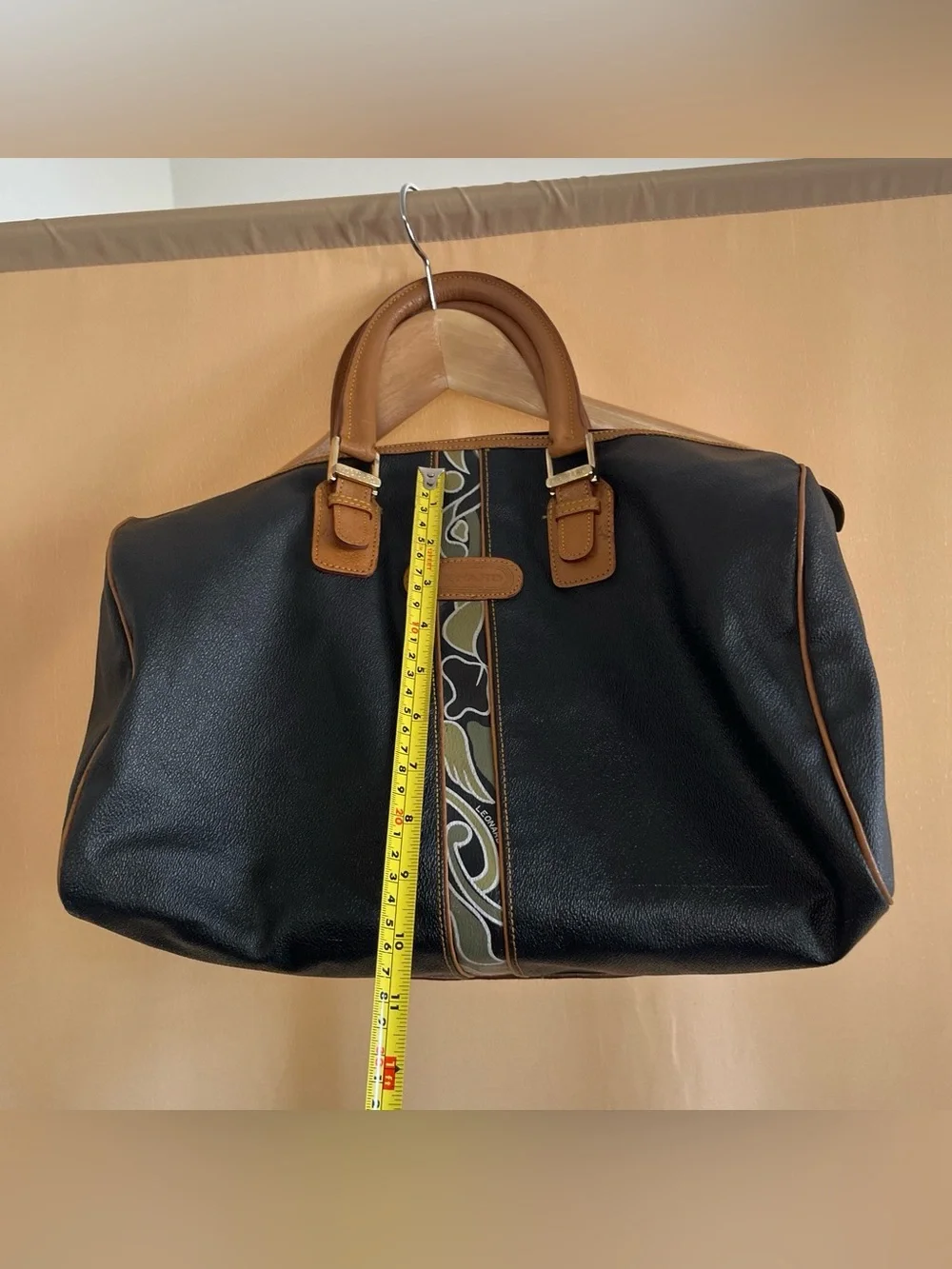 Black Leather Duffel Bag with Brown Trim and Olive Pattern Accent